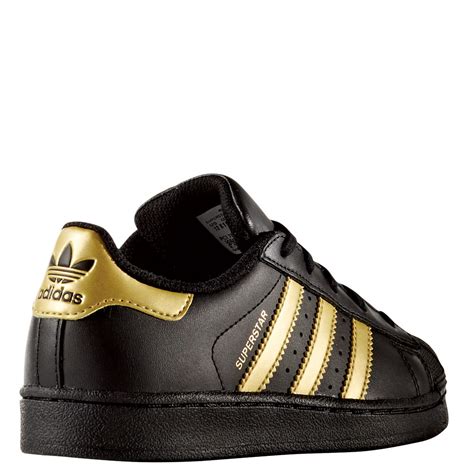 adidas schuhe schwarz gold mädchen|Gold .